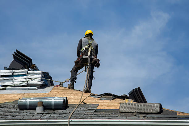 Professional Gutter Installation technician working in Woburn, MA